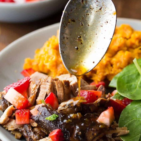 balsamic pork tenderloin with sweet potatoes and strawberry salsa with spoon drizzling dressing