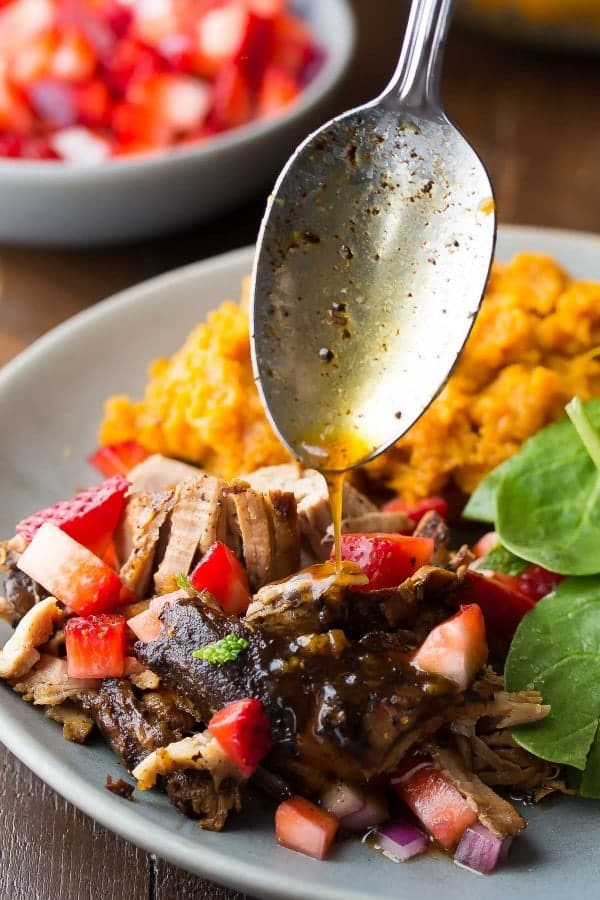 balsamic pork tenderloin with sweet potatoes and strawberry salsa with spoon drizzling dressing
