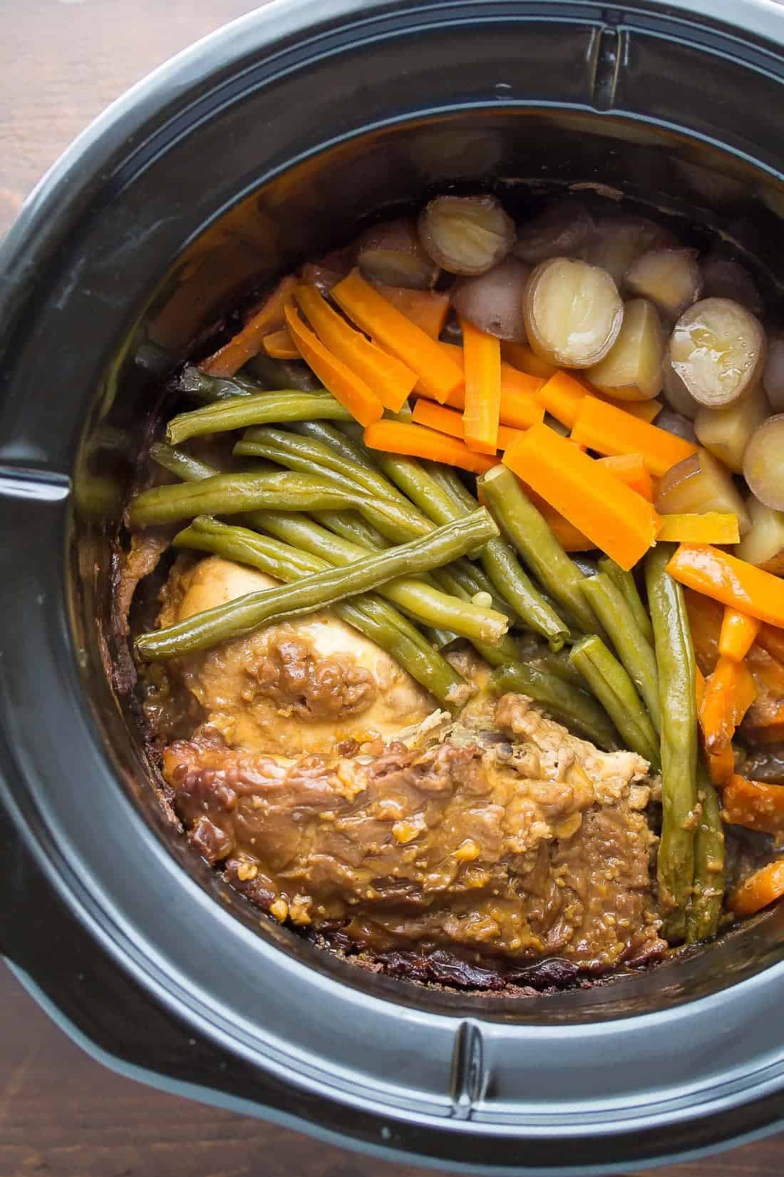 slow cooker peanut ginger chicken in slow cooker after cooking through