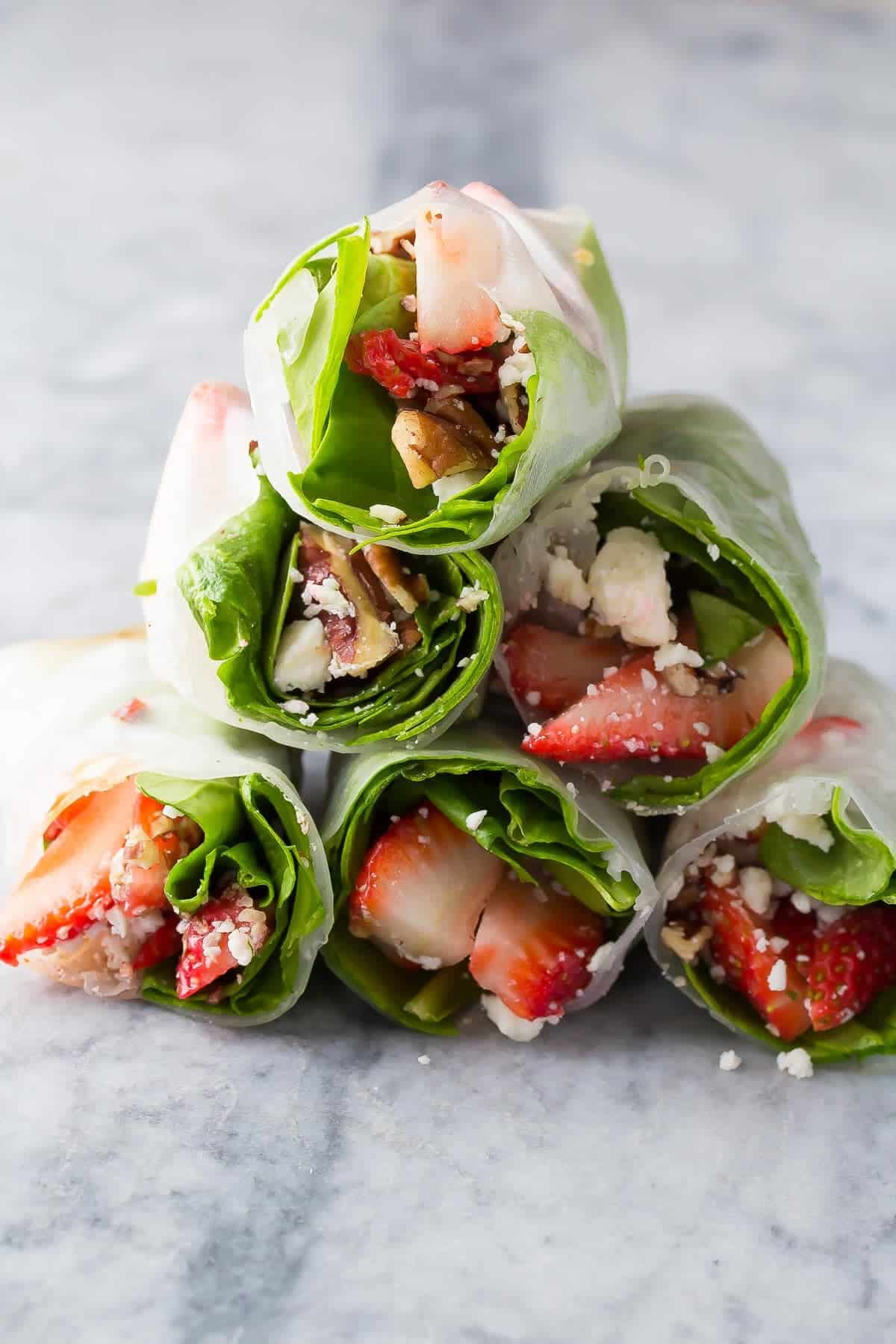Stack of strawberry spinach summer rolls