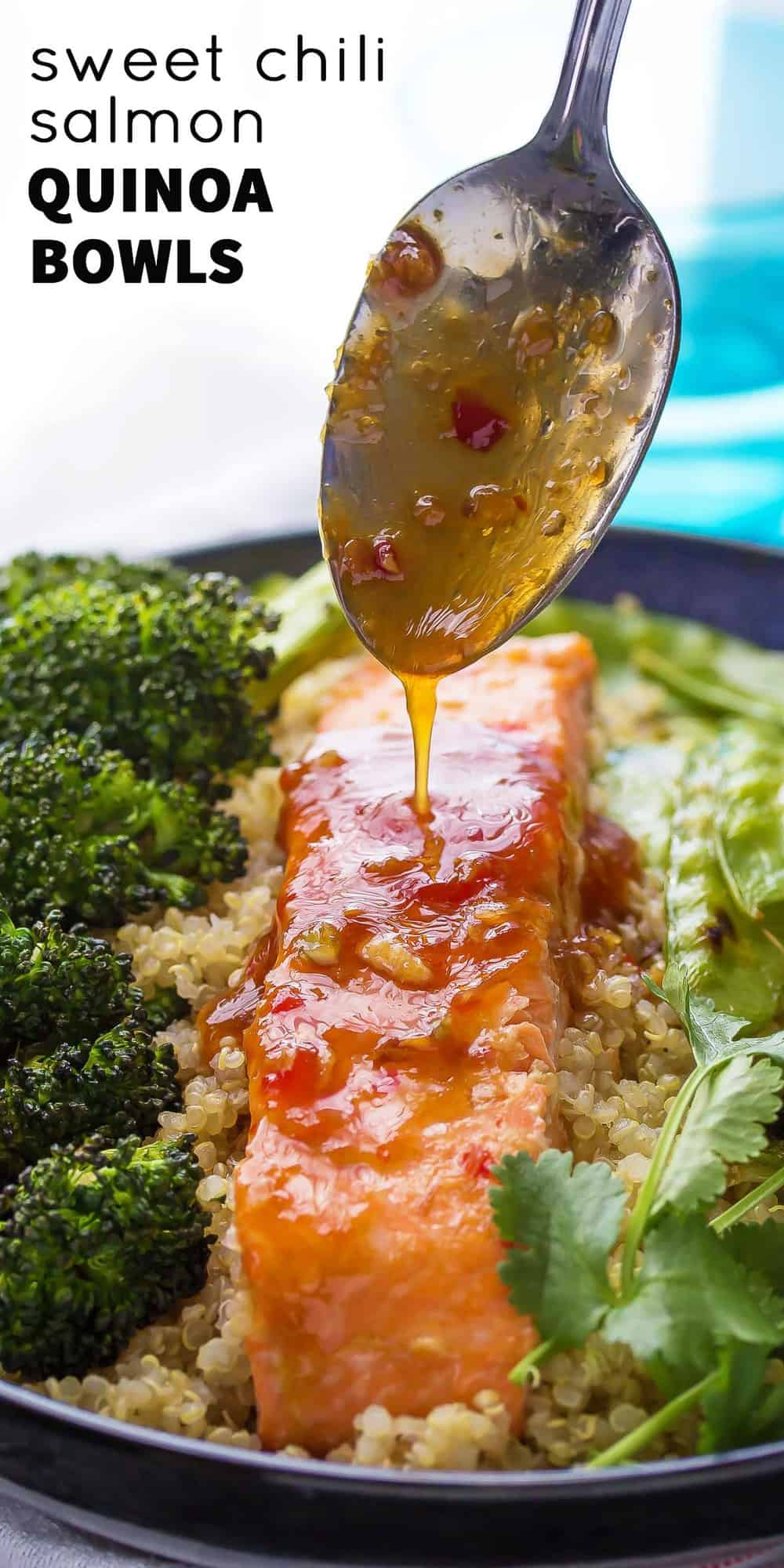 A delicious and healthy dinner recipe: sweet chili salmon is served with roasted broccoli and snap peas on a quinoa bowl! Makes a great lunch, as well.