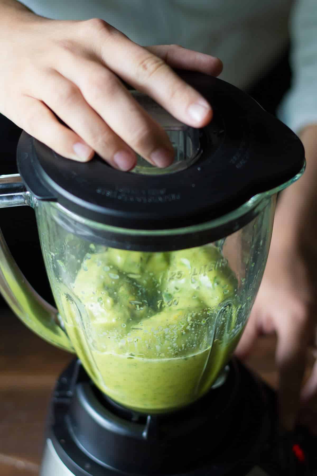 Green Mango Superfood Smoothie being blended