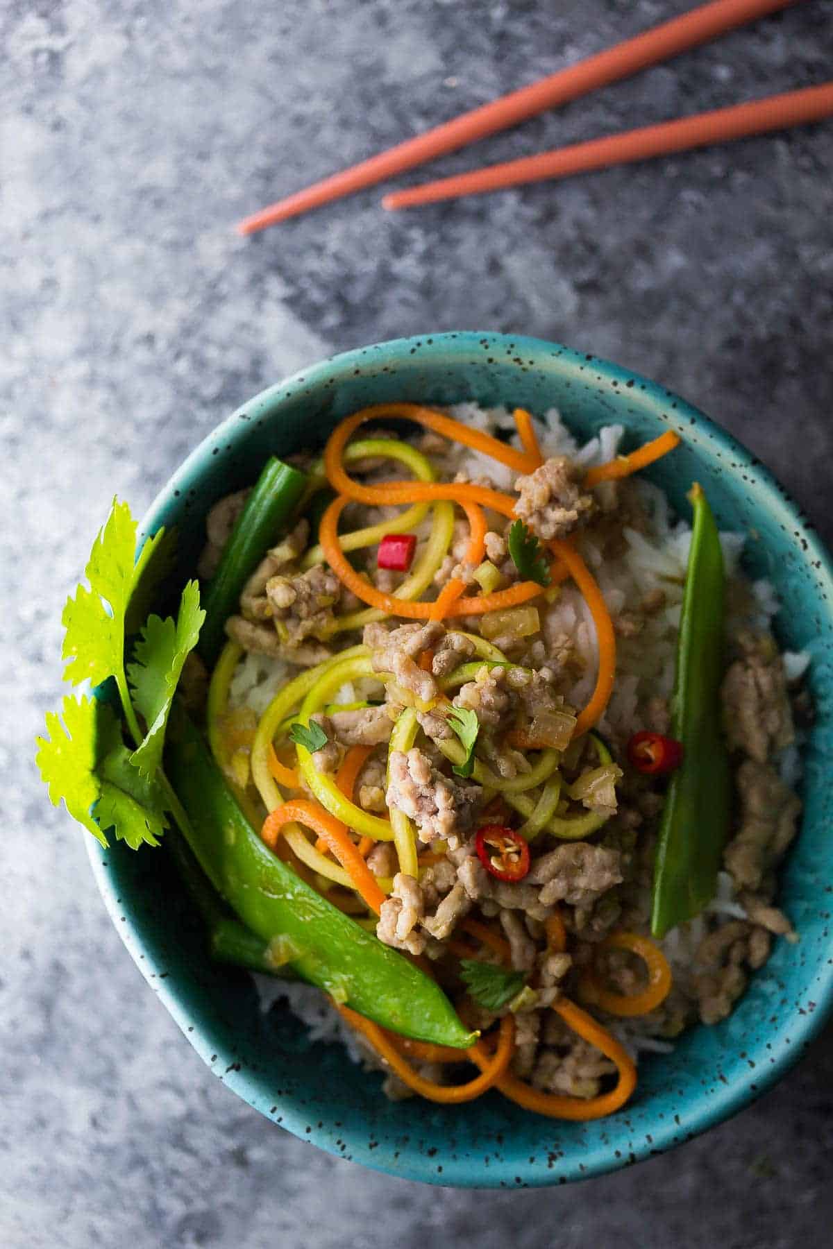 Lemongrass Thai Ground Pork Stir Fry in a blue bowl