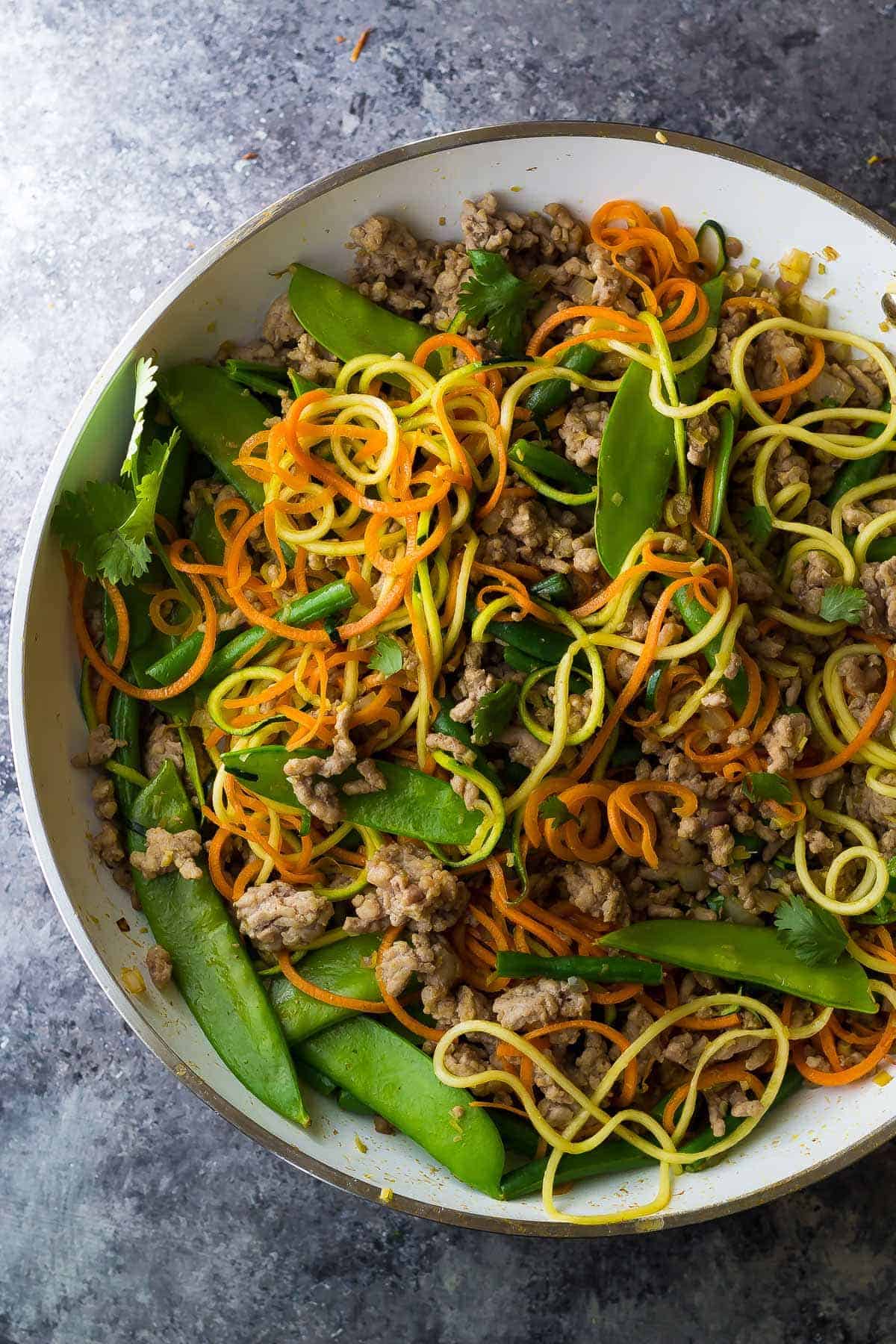 Lemongrass Thai Ground Pork Stir Fry in a skillet