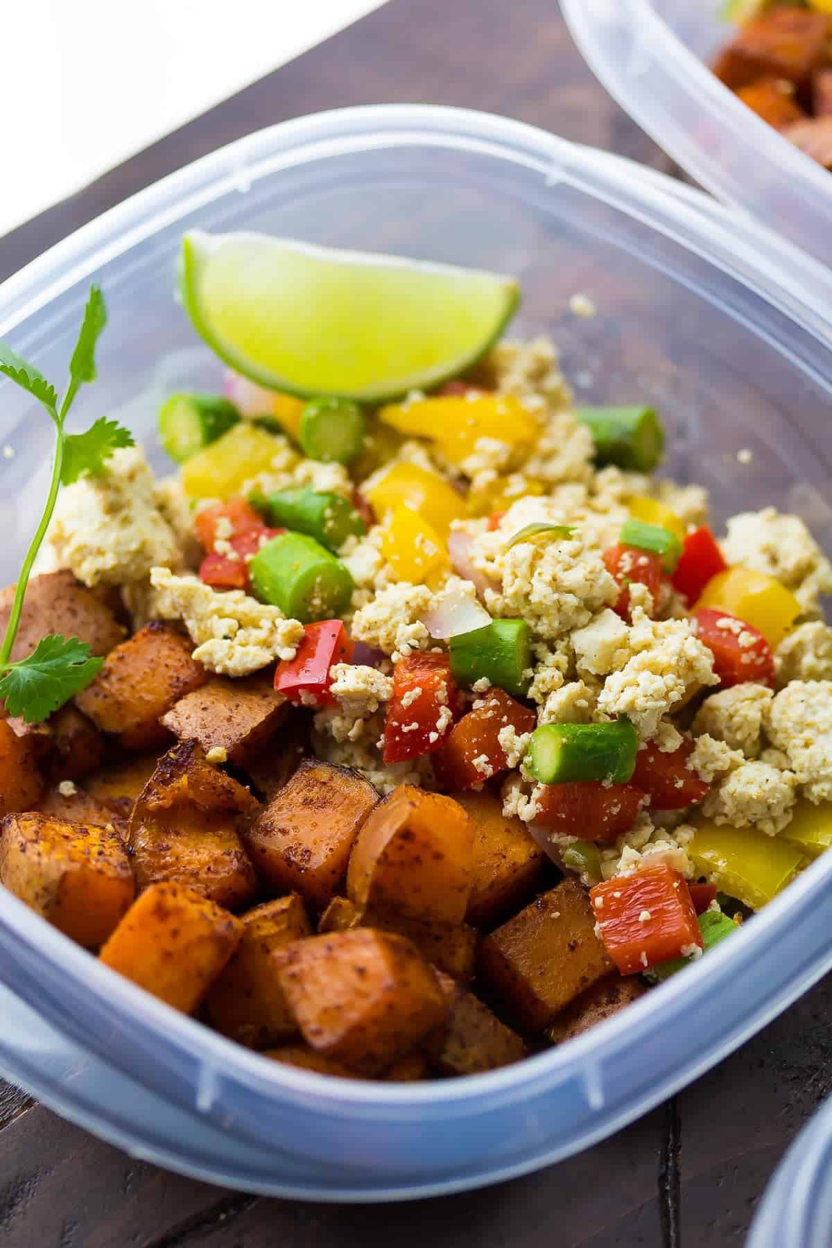 Tofu Scramble & Breakfast Sweet Potatoes in a meal prep container 