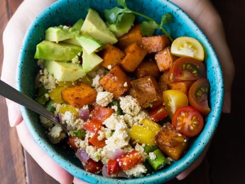 Plant-based tofu scramble breakfast bowl with veggies and sweet potato