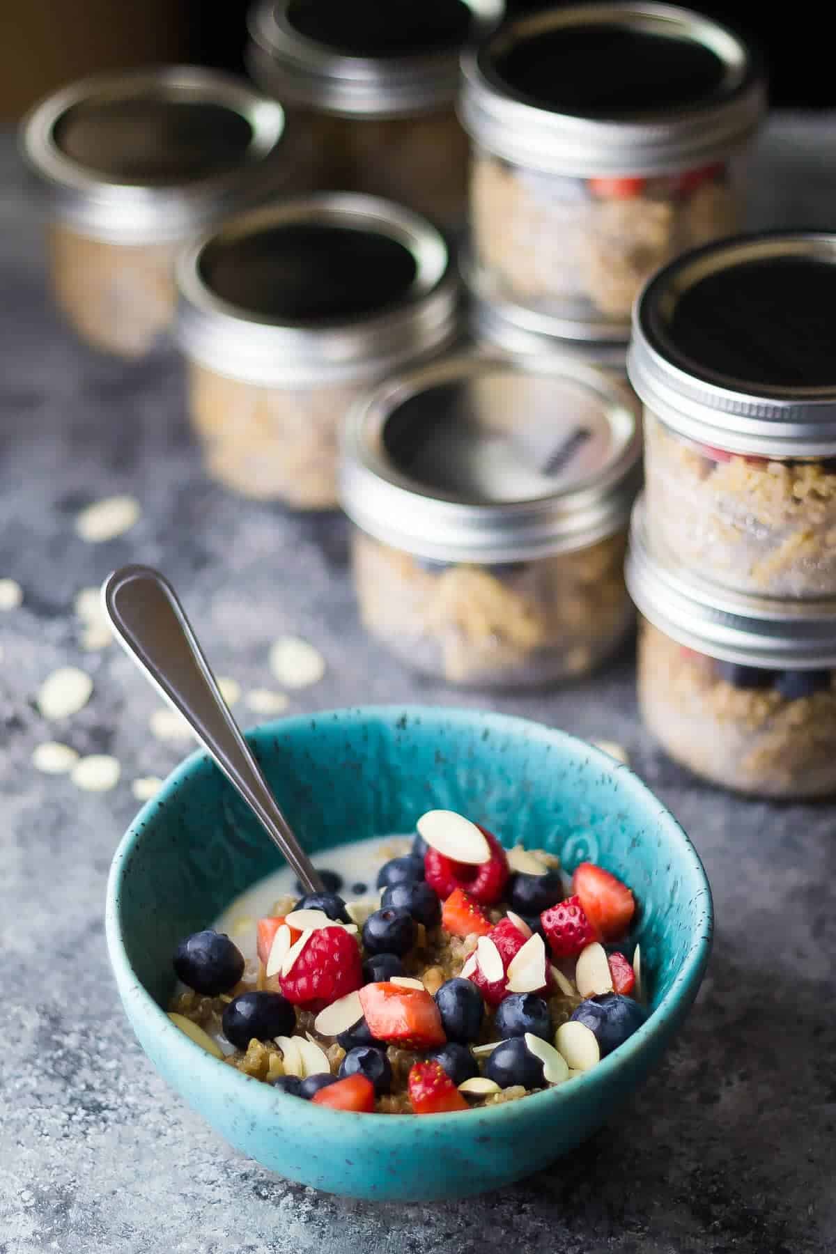 Berry quinoa breakfast bowl with spoon