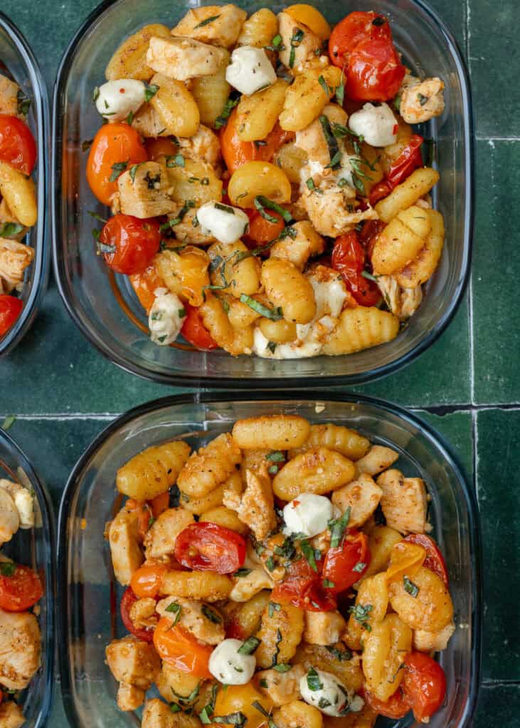 overhead shot of chicken gnocchi meal prep bowls