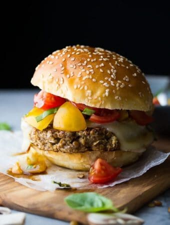 mushroom lentil bruschetta burger with bun on parchment