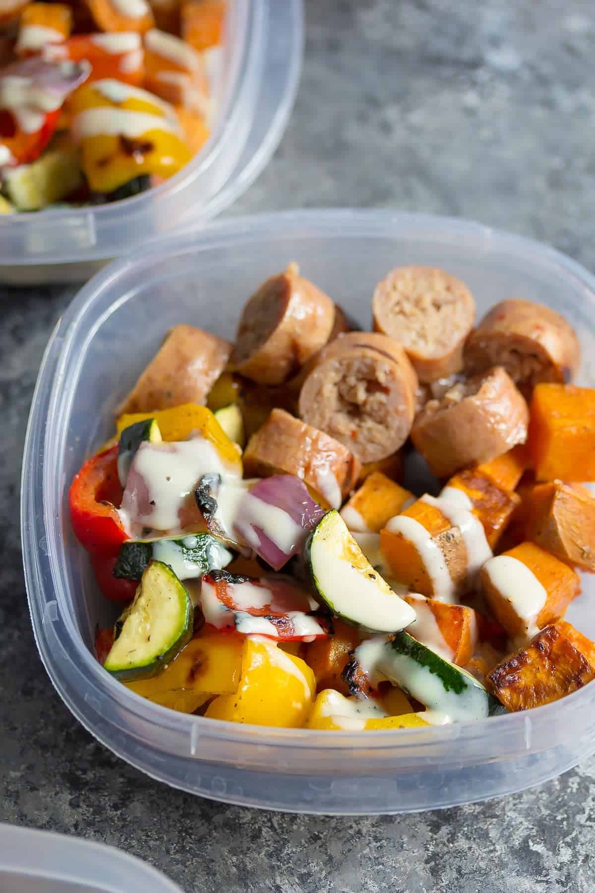 Close up of Turkey Sausage & Sweet Potato Lunch Bowls with tahini sauce