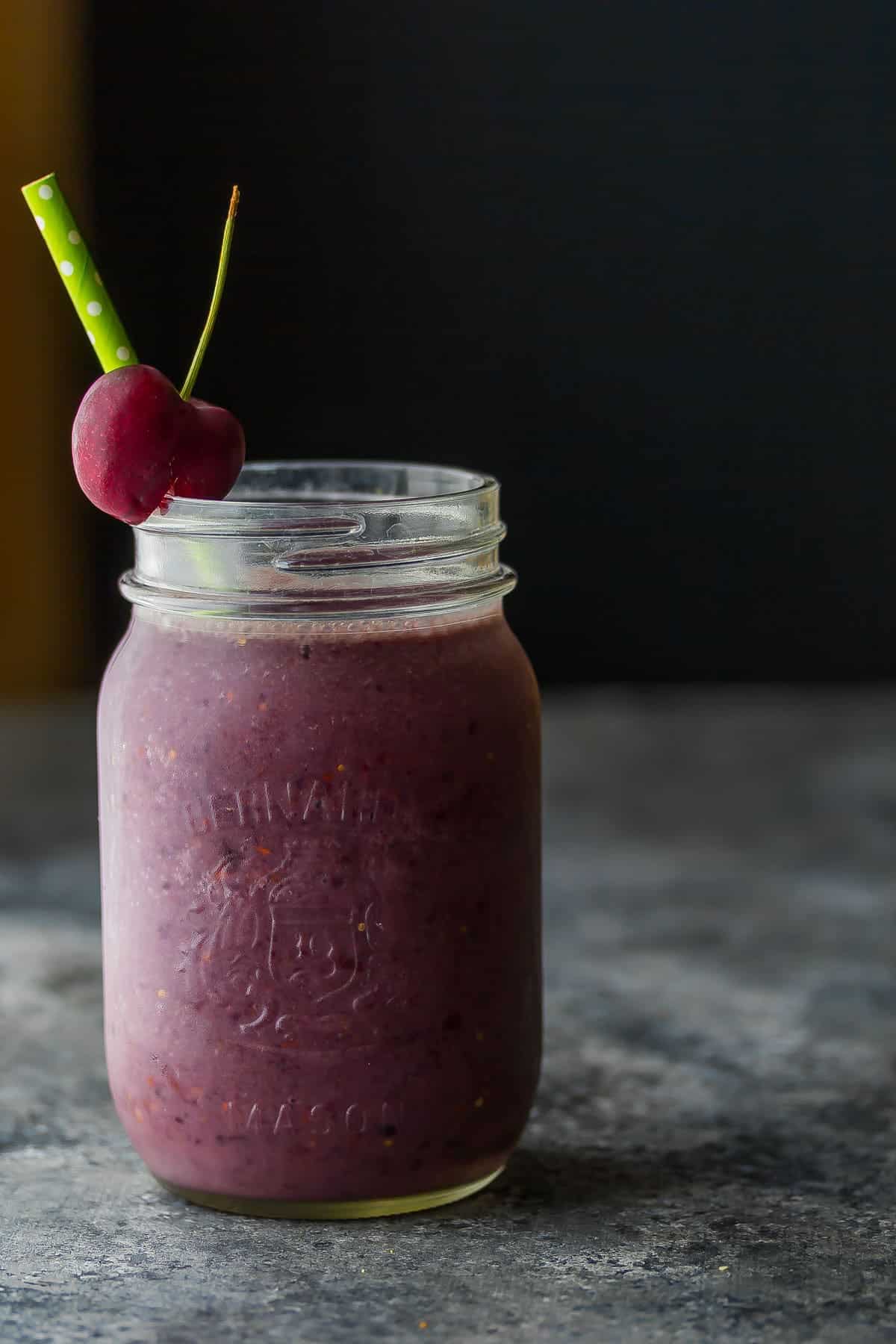 side angle view of peach cherry goji smoothie