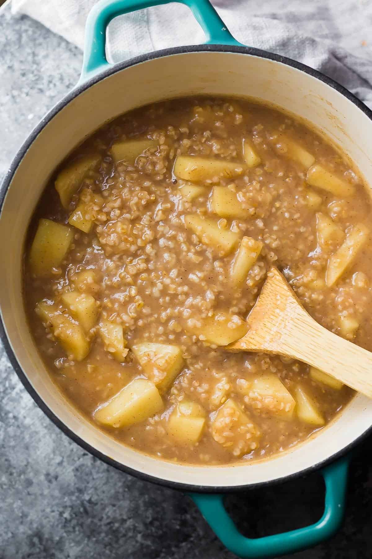 Maple Apple Steel Cut Oats in dutch oven cooking