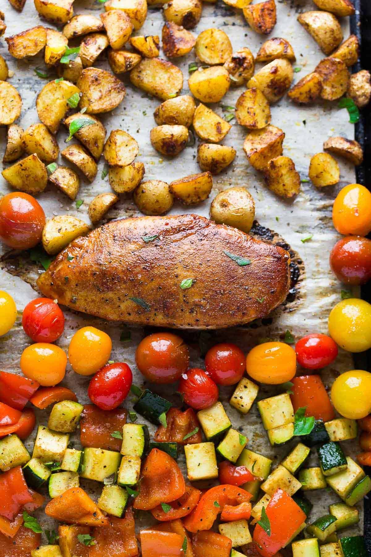 Cooked Spicy Paprika Chicken & Cherry Tomato recipe on sheet pan