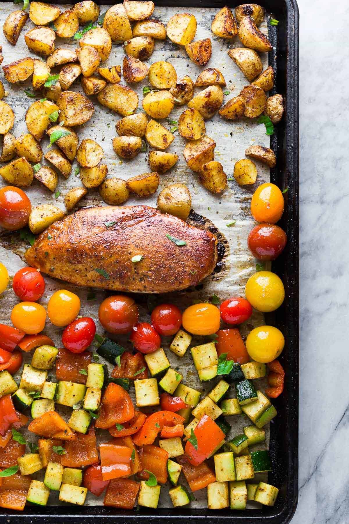 Cooked Spicy Paprika Chicken & Cherry Tomato recipe on sheet pan