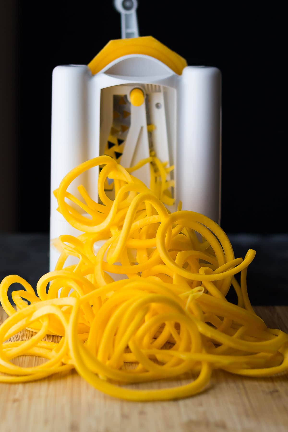 spiralized butternut squash on cutting board