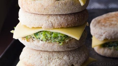 stack of three healthy breakfast sandwiches with one in background