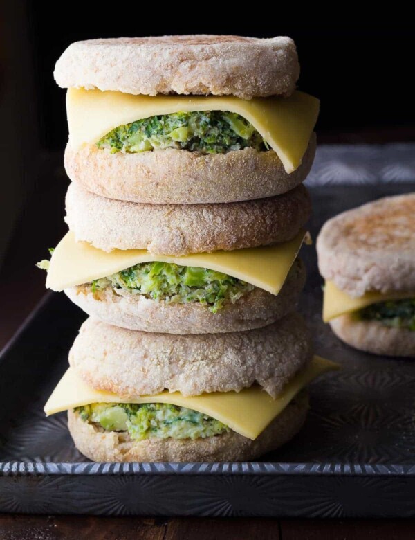 stack of three healthy breakfast sandwiches with one in background