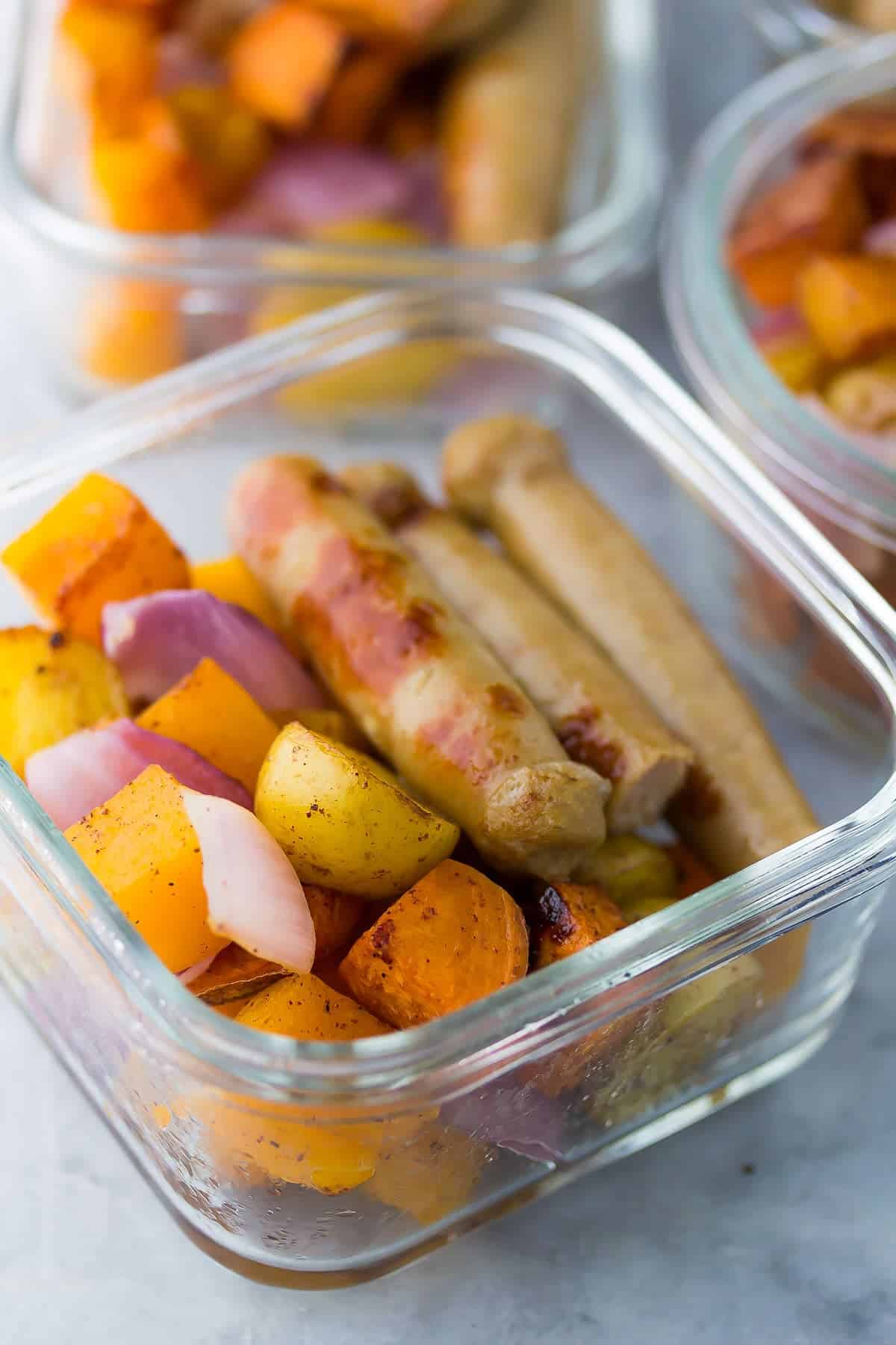 close up shot of sausage breakfast bowl in meal prep container