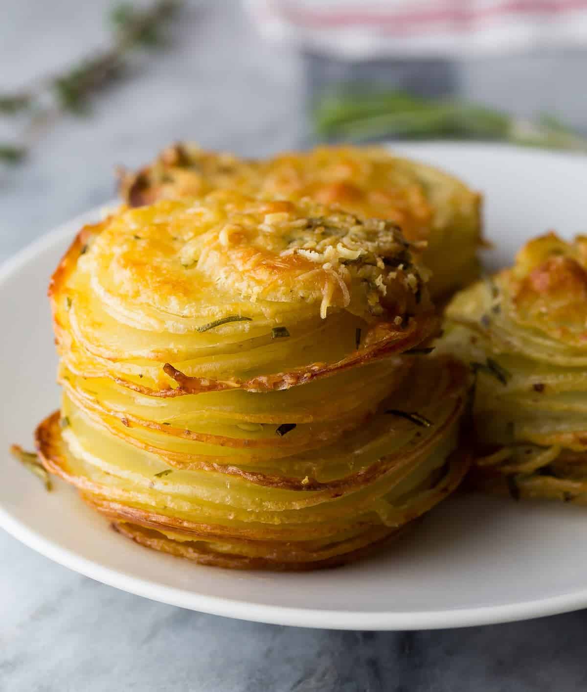 side view of herb and garlic potato stacks