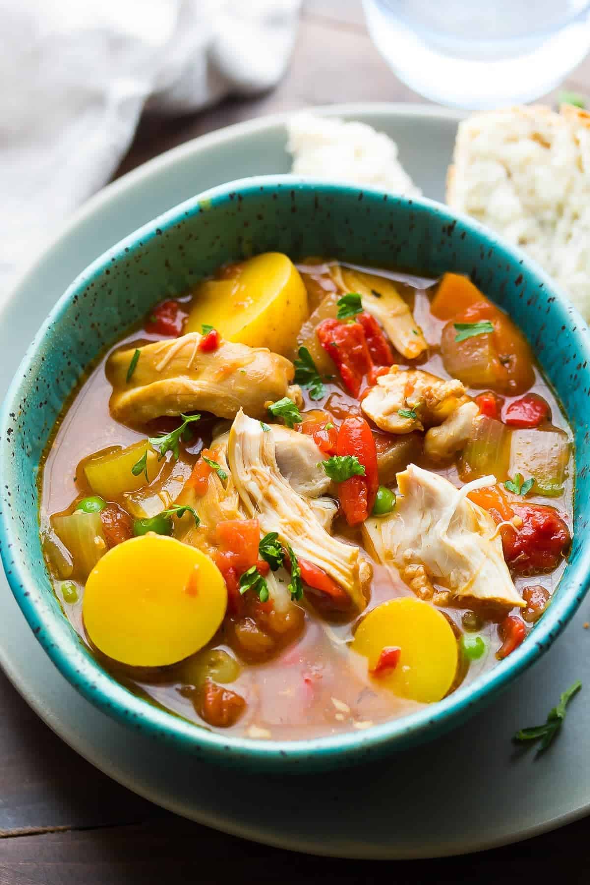 Slow Cooker Spanish Chicken Stew in a blue bowl