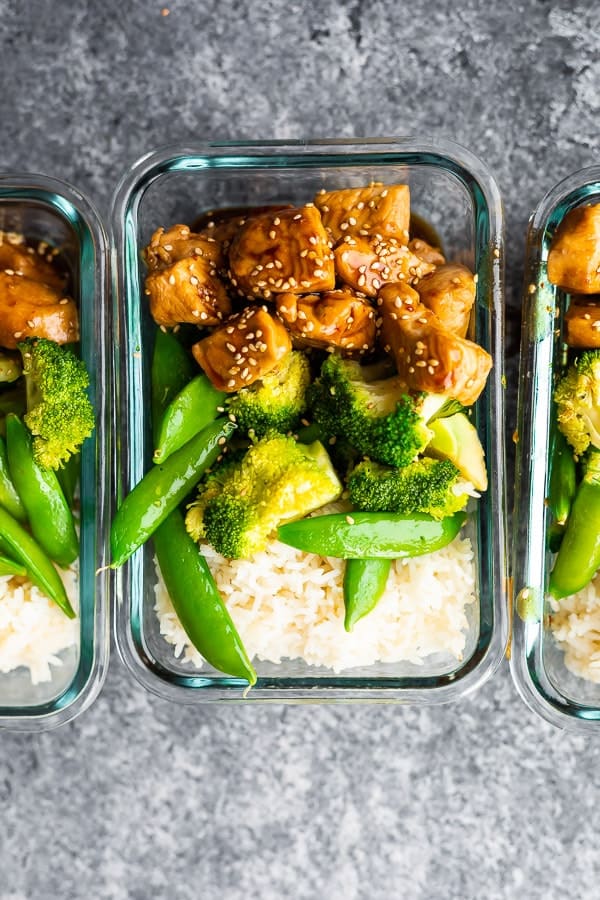 overhead shot of Honey Sesame Chicken Lunch Bowls in meal prep container