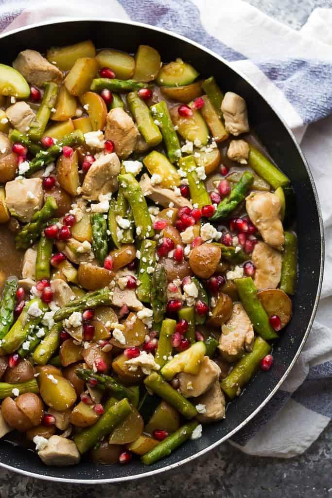 close up shot of skillet with winter chicken and veggies