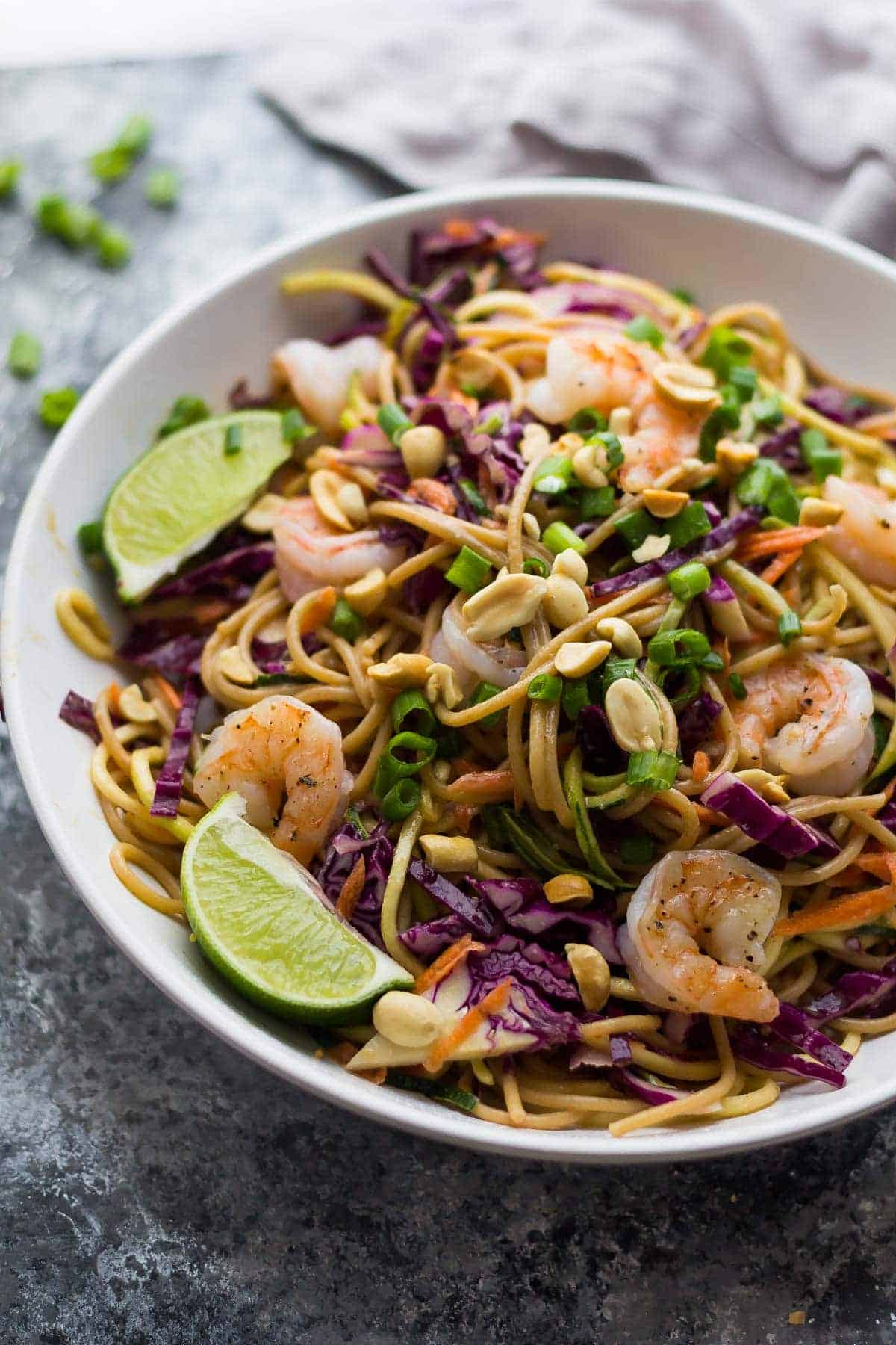 Spiralized Veggie Thai Noodle Bowls with shrimp, peanuts, and lime