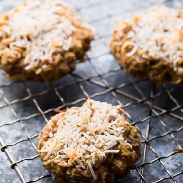 three healthy apple almond butter snack cookies cooling on wire rack