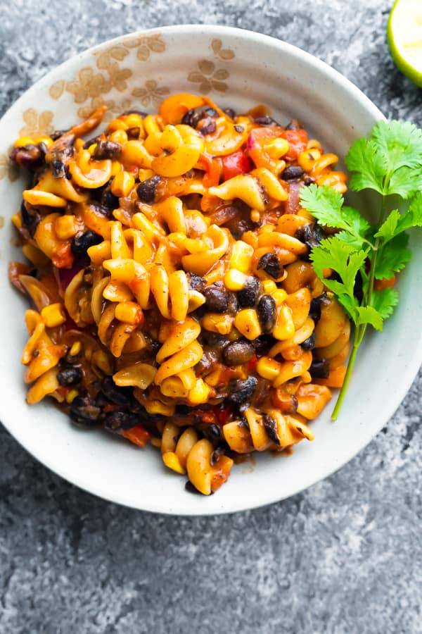 fajita pasta in bowl with sprig of cilantro