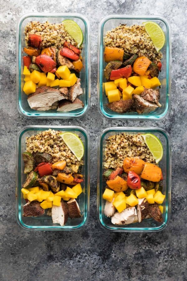 overhead view of four Jerk Chicken Meal Prep Lunch Bowls