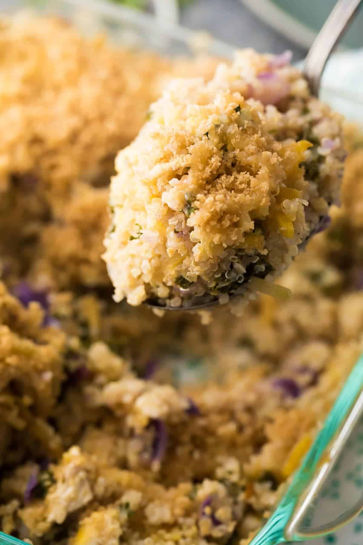 close up shot of a spoonful of Chicken Quinoa Casserole after baking
