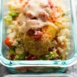 glass meal prep container with mexican chicken cauliflower rice bowl