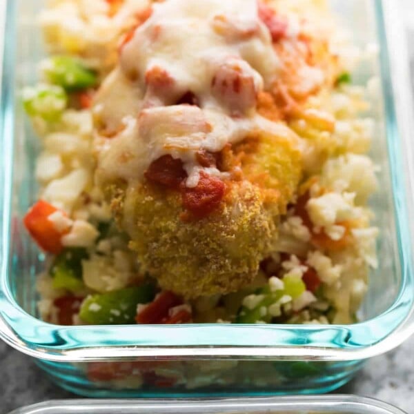 glass meal prep container with mexican chicken cauliflower rice bowl