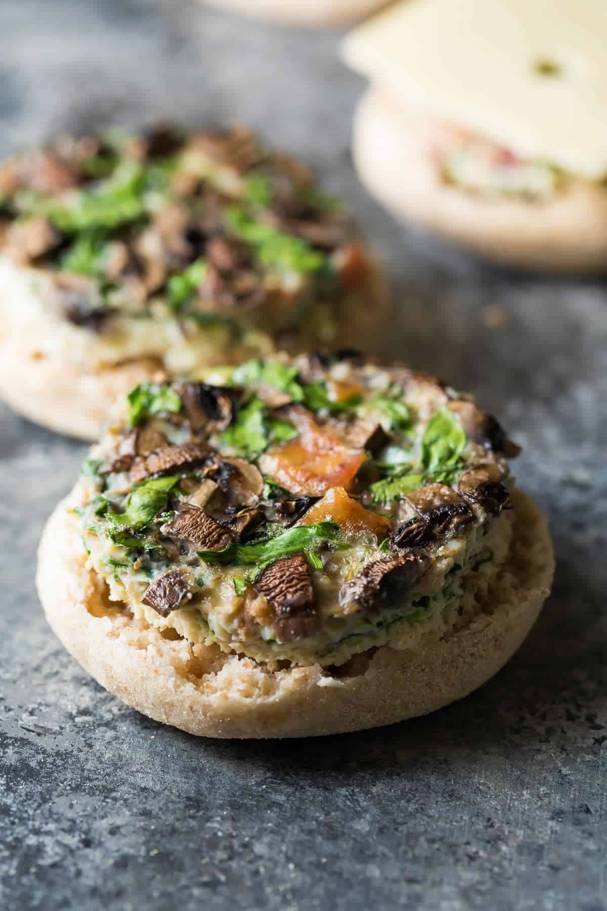 Close up view of an Open Mushroom bacon breakfast sandwich