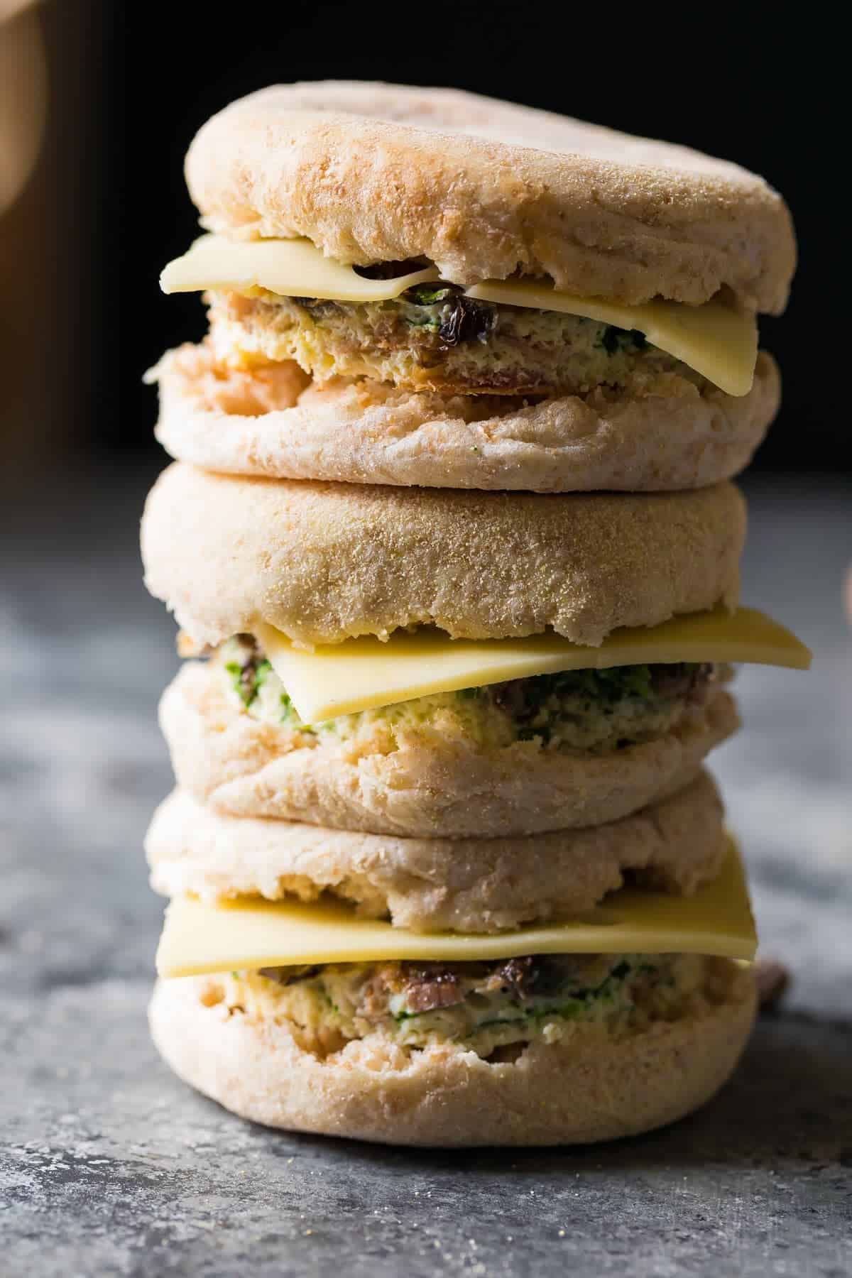 Stack of three Mushroom bacon breakfast sandwiches 