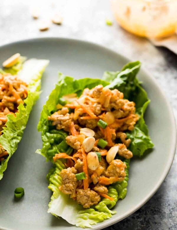 thai turkey lettuce wraps on gray plate