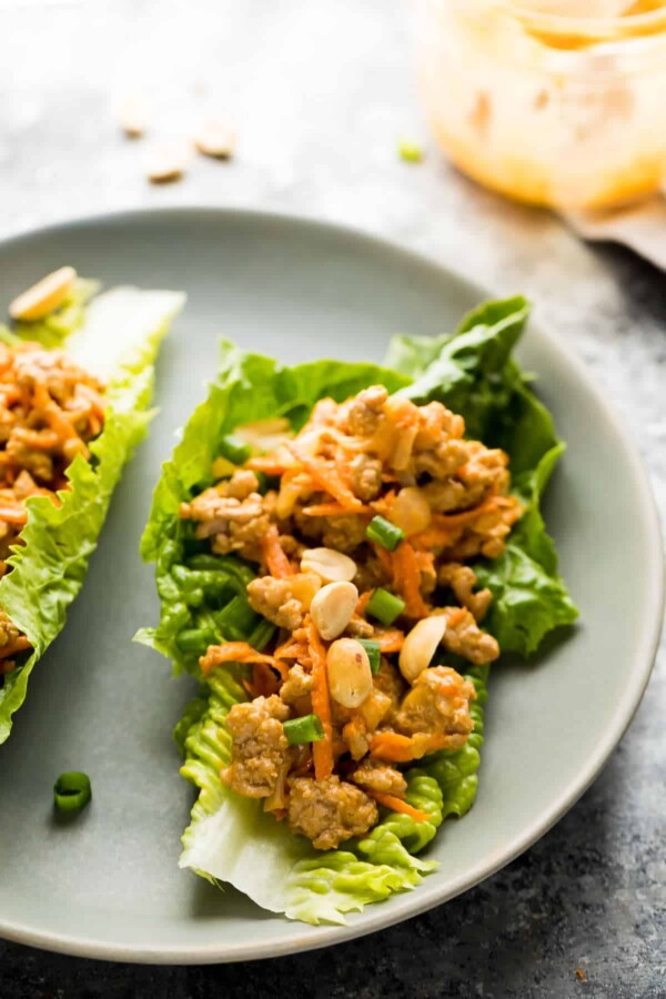 thai turkey lettuce wraps on gray plate