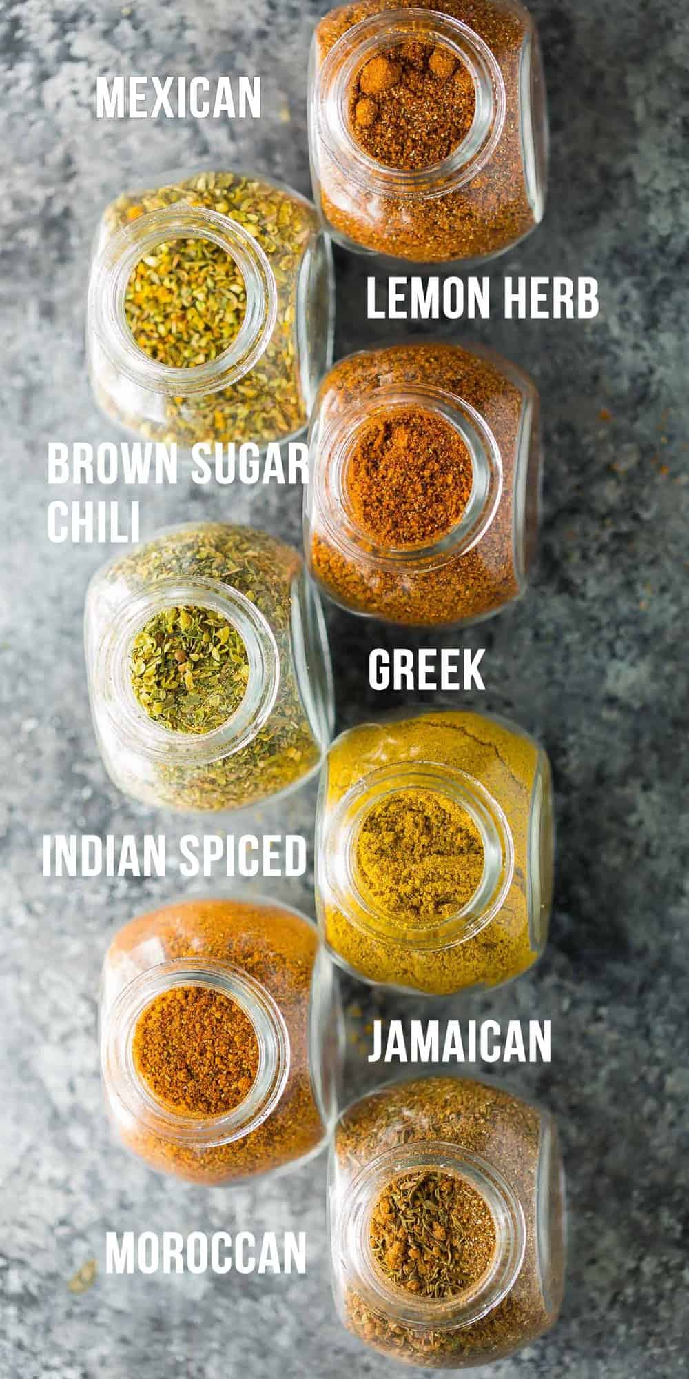A variety of seven dry rub recipes in glass jars with names