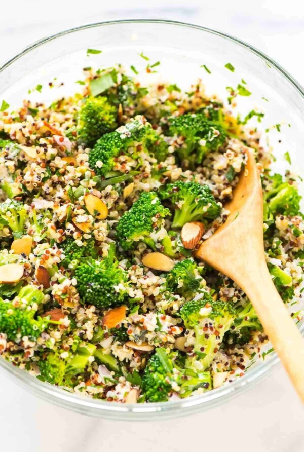 Broccoli Quinoa Salad with Creamy Lemon Dressing in large glass bowl