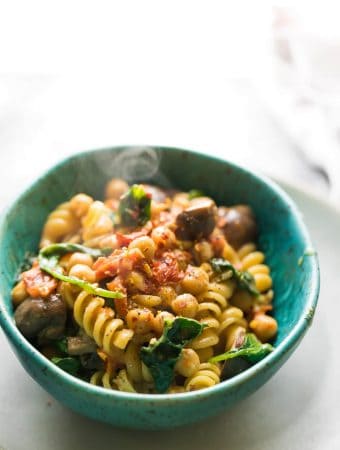 Sun dried tomato pasta in a blue bowl