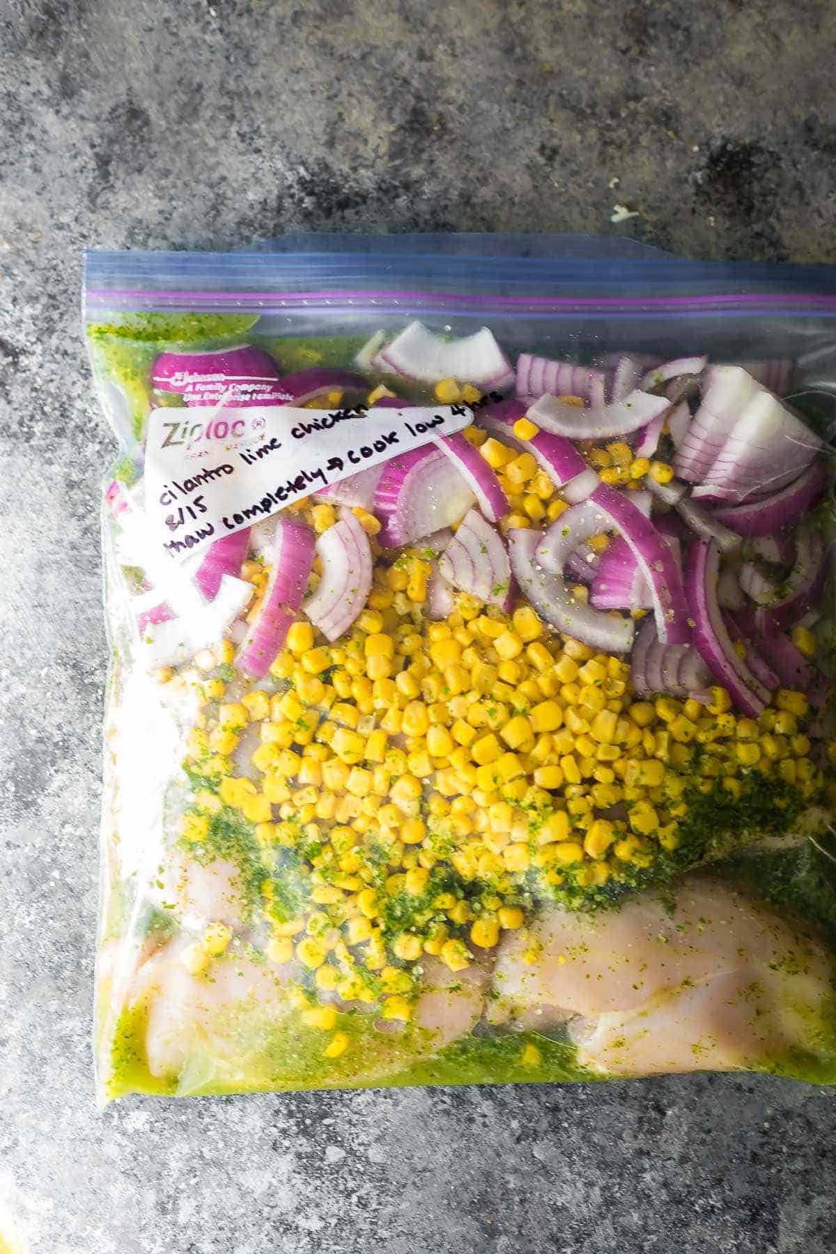 ingredients for cilantro lime chicken tacos in a freezer bag