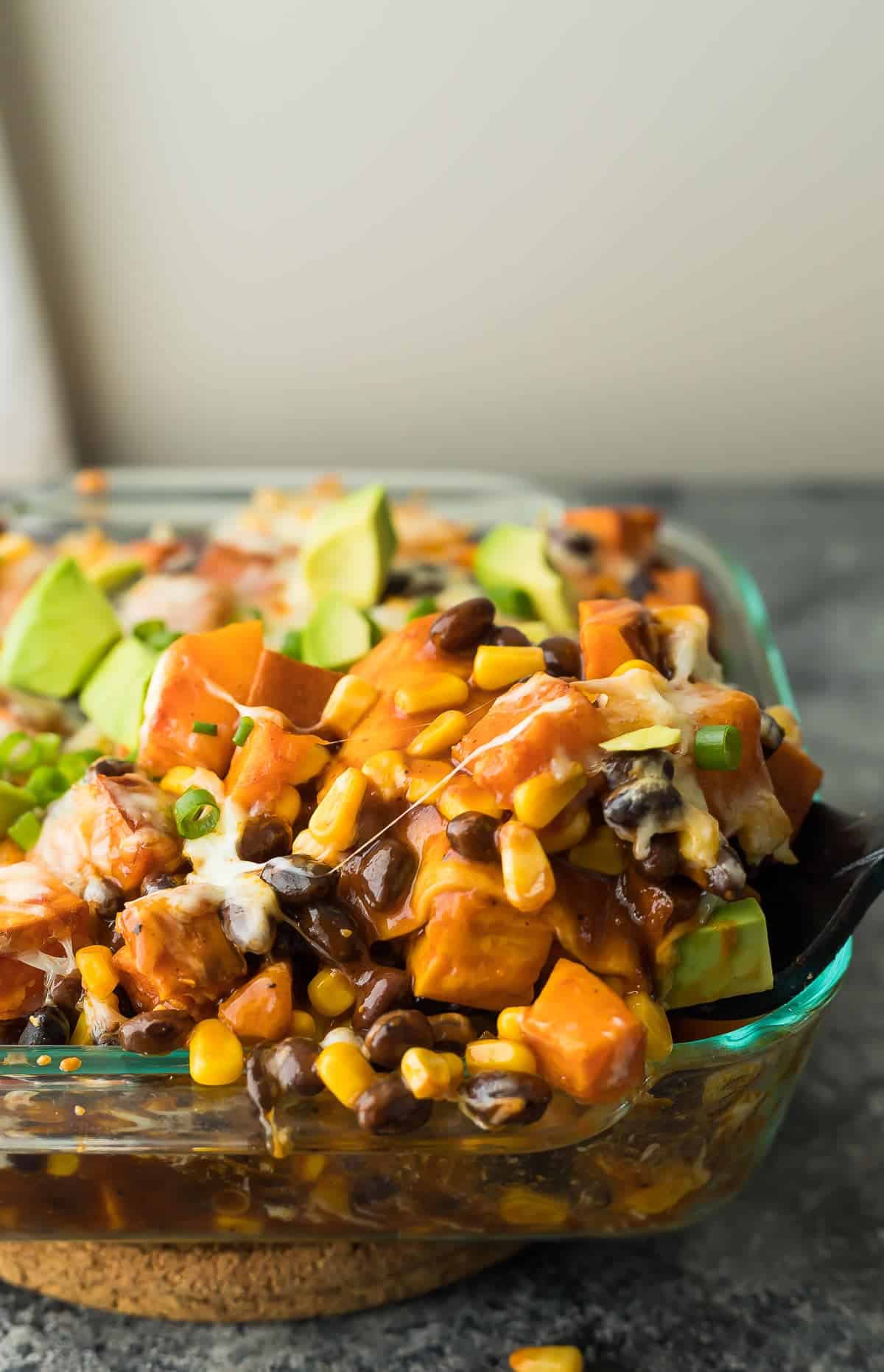 butternut squash enchilada casserole in glass baking dish