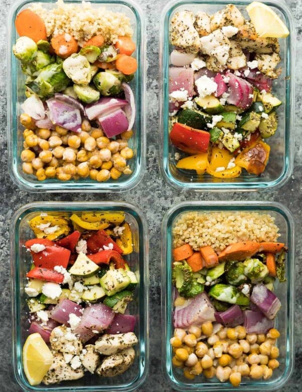 overhead shot four glass meal containers with chickpea buddha bowls and greek chicken wraps
