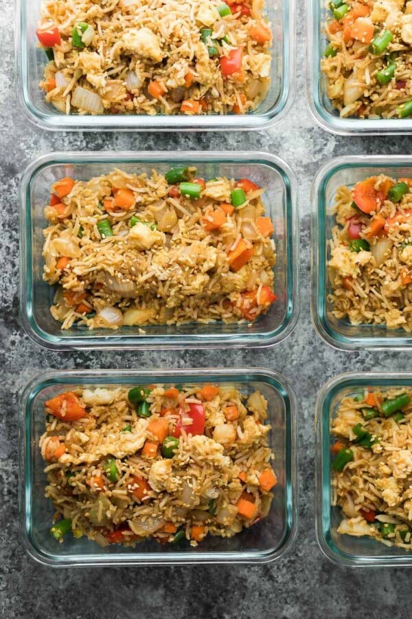 meal prep containers with fried rice lined up