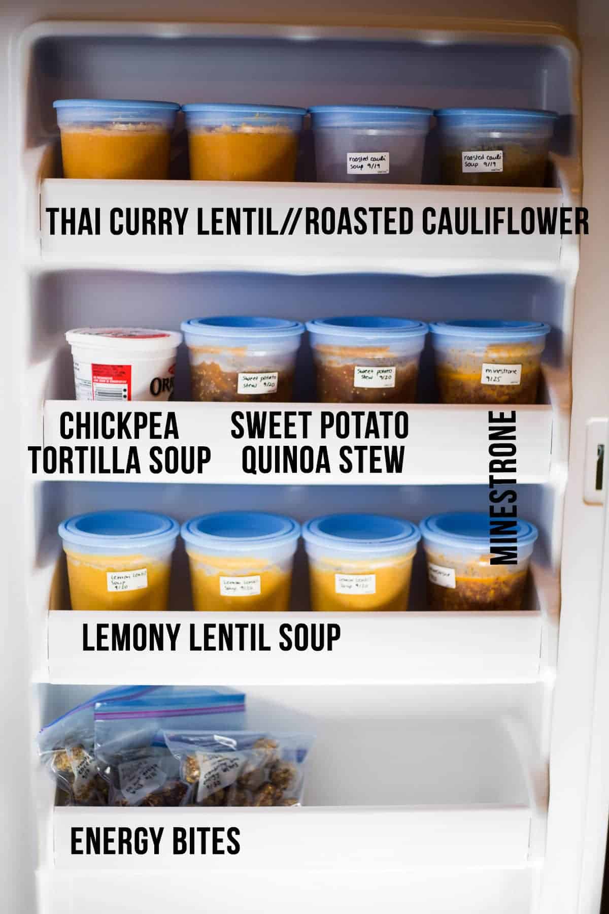 freezer door with 12 plastic freezer jars filled with soup