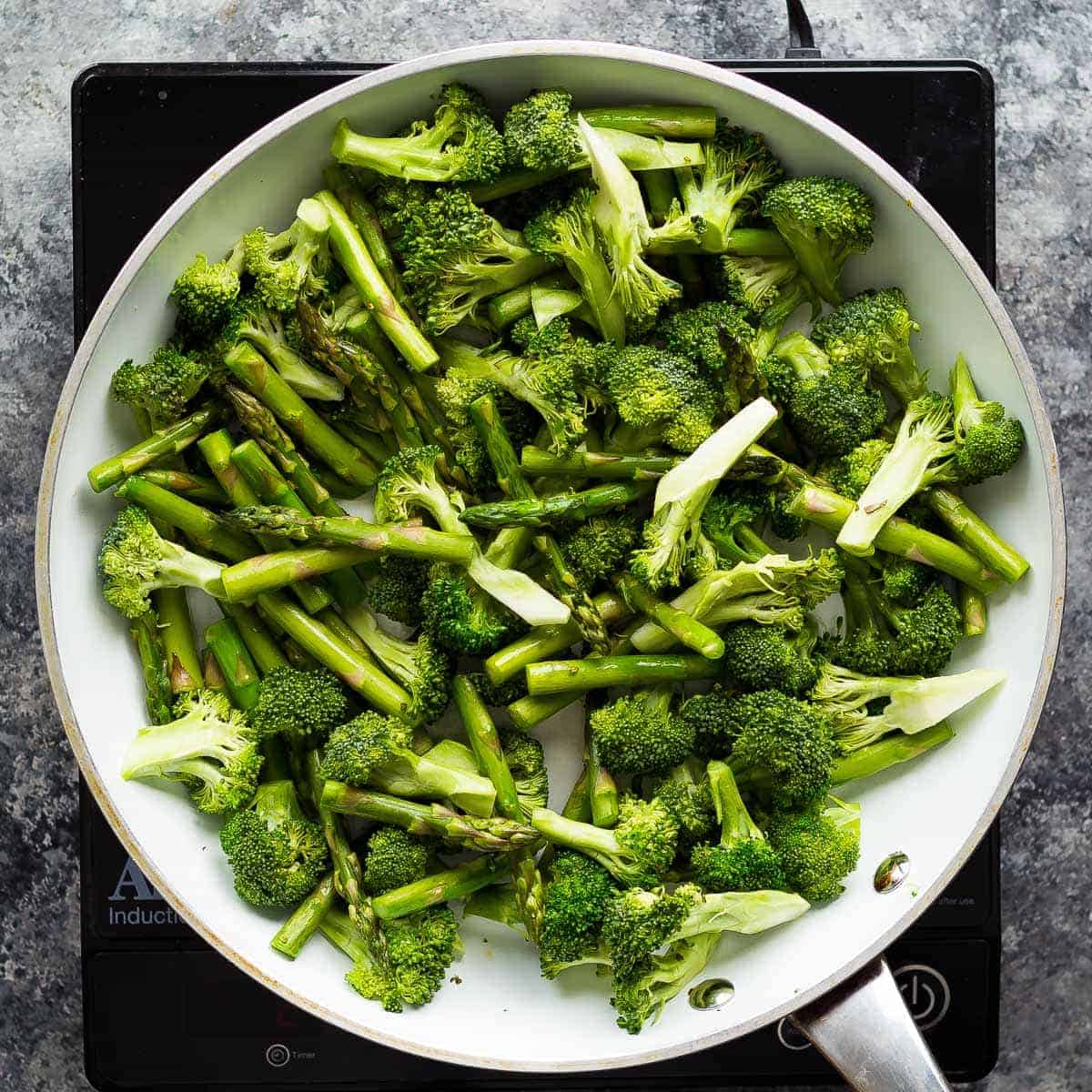 Prep this meal prep stir fry with two difference sauces (honey sriracha and lemon sesame) to get completely different flavors in your lunch! Prep them both in under 45 minutes.