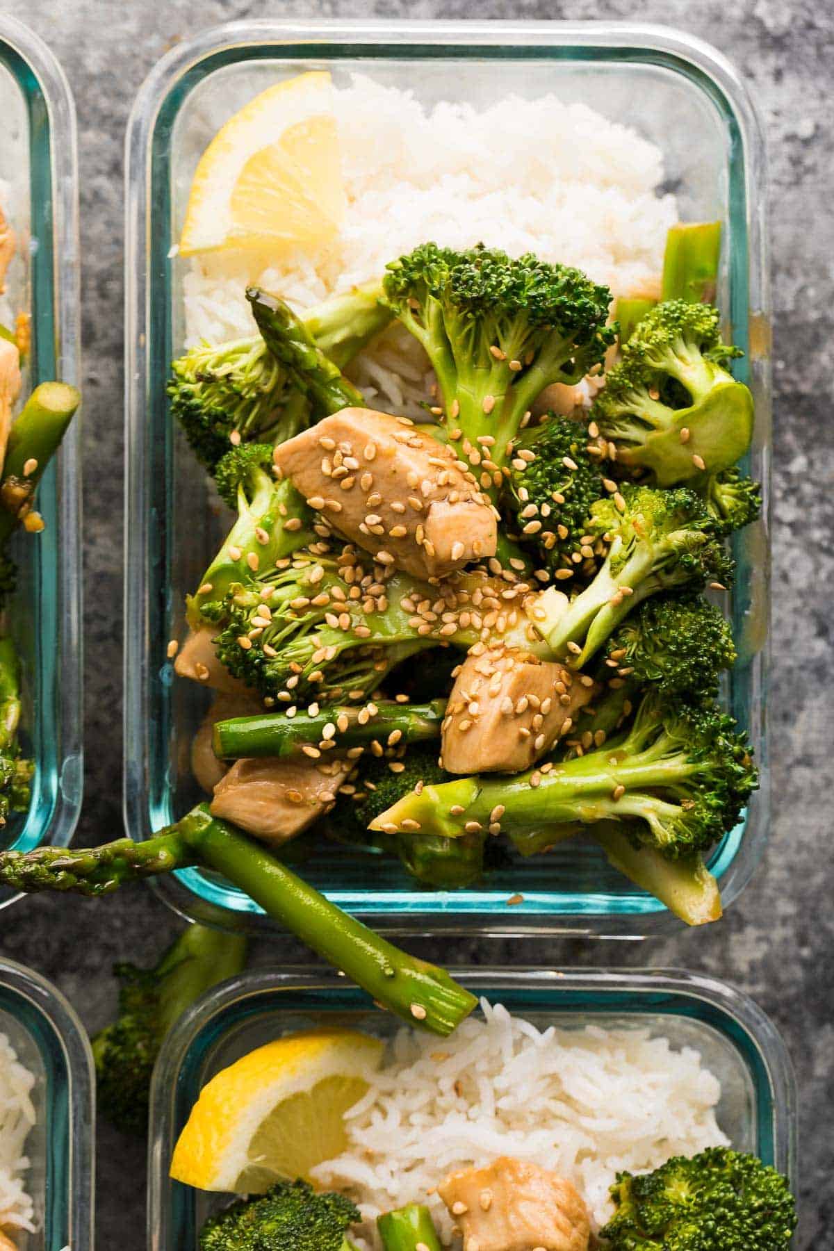 Prep this meal prep stir fry with two difference sauces (honey sriracha and lemon sesame) to get completely different flavors in your lunch! Prep them both in under 45 minutes.