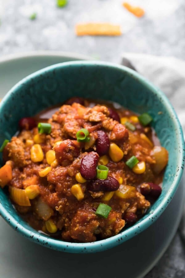 slow cooker turkey chili in a blue bowl