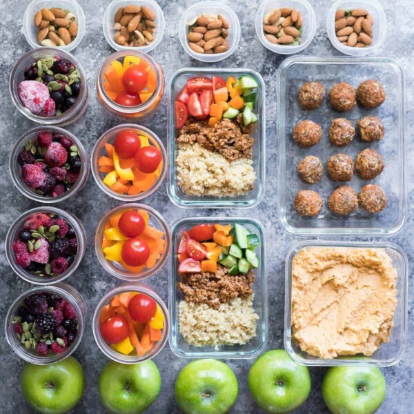 overhead shot of a variety of foods on gray background