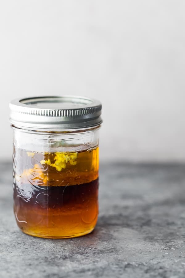 side view of vinaigrette in jar